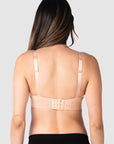 Kami, expecting mother of 2, demonstrating the versatile standard or convertible racerback feature of Hotmilk US's Ambition T-Shirt Wirefree nursing and maternity bra in shell pink, designed for maternity, nursing, and breastfeeding comfort