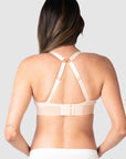 Kami, expecting mother of 2, demonstrating the versatile convertible racerback feature of Hotmilk US's Ambition T-Shirt Wirefree nursing and maternity bra in shell pink, designed for maternity, nursing, and breastfeeding comfort