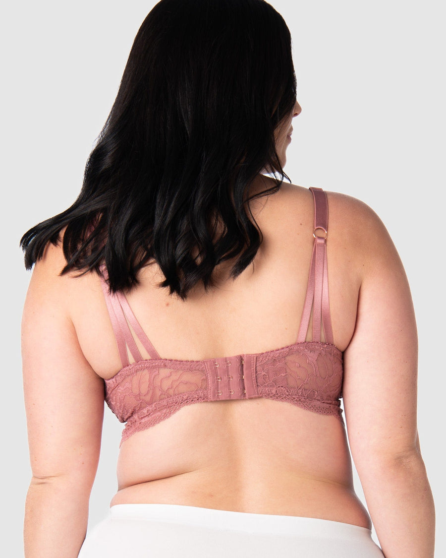 Olivia showing the back view of the Heroine nursing bralette in 36D-I by Hotmilk Lingerie US, highlighting the stunning soft lace back and multi-strap detailing. With 6 rows of hook and eye closures for flexibility, this versatile crop-style nursing bralette uniquely adapts to different sizes. Perfectly suited for the postpartum period, it caters to uncertain sizing needs and effortlessly adjusts to your evolving cup shapes throughout your entire breastfeeding journey