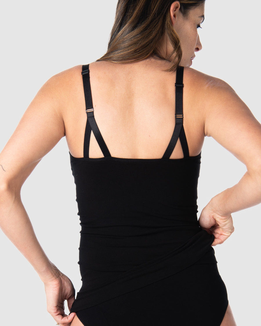 Rear view of the My Necessity Camisole by Hotmilk Lingerie US in black. This camisole serves as the ideal base layer, featuring a long line design that covers a pregnant belly and offers postpartum comfort and support
