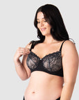 Olivia showcases the nursing clip functionality on Hotmilk US award-winning Temptation in Black. Meticulously crafted for larger cup sizes, this bra provides a blend of style, support, and comfort throughout your breastfeeding journey