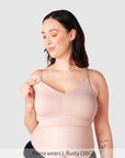 Model wearing Hotmilk My Necessity bra in Ballet Pink, showing front view with nursing clips and full cup support.