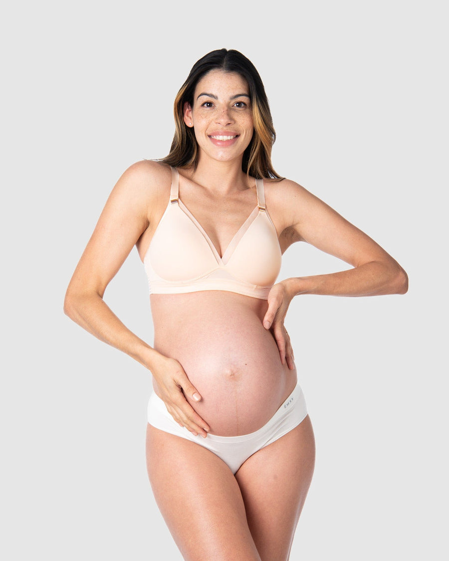 Kami, pregnant mother of 2, showcasing the full-body view of Hotmilk US's Ambition T-Shirt Wirefree nursing and maternity bra in shell pink, thoughtfully crafted for maternity, nursing, and breastfeeding comfort