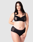 Complete ensemble: Olivia donning Hotmilk Lingerie US's Enlighten Balconette maternity, nursing, and breastfeeding bra in 14/36D, providing flexiwire support for maximum comfort and style