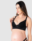 For date nights and special occasions, Goddess by Hotmilk Lingerie US presents intricate floral lace, edgy strap detailing, and a plunging neckline with flexi underwire and contour cup for coverage. Kami, an expectant mother of 2, demonstrates the featured sleek black magnetic nursing clips. A truly sexy, edgy, and empowering choice throughout pregnancy and breastfeeding