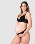 Kami, an expectant mother of 2, elegantly adorns Goddess, the edgy floral lace maternity and nursing bra by Hotmilk Lingerie. This bra features a half cup contour and flexi underwire support, enhancing its plunging style for an alluring touch on memorable date nights and special occasions