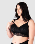 Olivia demonstrating the nursing clip on Hotmilk Lingerie's best-selling Heroine Nursing bralette, an ideal crop-style nursing bra designed for uncertain bra sizes. Crafted with soft sheer lace, this multifit crop nursing bra is perfect for the postpartum period