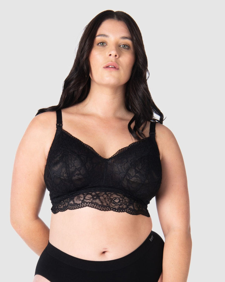 Olivia wears the Heroine nursing bralette in 36D-I by Hotmilk Lingerie US, highlighting the sheer soft lace back and intricate multi-strap detailing. An ideal choice to include in your hospital delivery bag. This versatile crop-style nursing bralette effortlessly accommodates various sizes, perfectly suited for the postpartum phase. It caters to uncertain sizing needs and seamlessly adapts to changing cup shapes, ensuring comfort throughout your entire breastfeeding journey