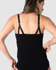 Rear view of the My Necessity Camisole by Hotmilk Lingerie US in black. This camisole serves as the ideal base layer, featuring a long line design that covers a pregnant belly and offers postpartum comfort and support