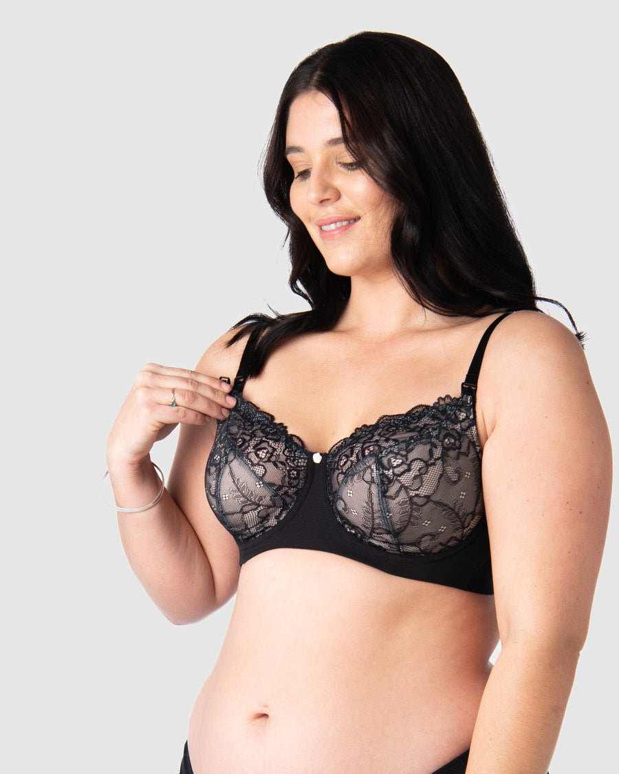 Olivia showcases the nursing clip functionality on Hotmilk US award-winning Temptation in Black. Meticulously crafted for larger cup sizes, this bra provides a blend of style, support, and comfort throughout your breastfeeding journey