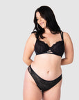 Embrace an edgy and modern maternity and nursing lingerie set by pairing the True Luxe flexiwire nursing bra with the semi-sheer floral lace bikini. Experience a sense of power, confidence, and support with this inclusive set, designed for larger bust sizes up to J cup. Hotmilk Lingerie stands as a world-class leader in delivering uncompromised and inclusive maternity and nursing style that empowers and uplifts