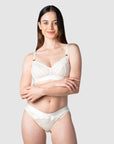Hotmilk's Warrior Soft Cup Nursing Bra effortlessly combines luxury and style, especially when paired with the matching Warrior Maternity Bikini Brief. Emily radiates in the Warrior maternity and nursing set, adorned with sheer lace and satin trims. This Hotmilk Lingerie ensemble is perfect for maternity photoshoots, pregnancy and postpartum