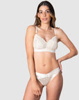 Teaming up with the Warrior Bikini Brief, Hotmilk's Warrior Soft Cup Nursing Bra seamlessly blends luxury, style, and comfort for your breastfeeding journey. Adorned with sheer lace and satin trim, this lush set is the perfect complement to enhance the radiance of a new mama like Kami. Frequently captured in stunning maternity shoots, this Hotmilk Lingerie US ensemble promises to elevate and support you, making it an indispensable choice for both fashion and function