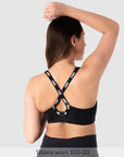 Straps worn racerback on Zen Contour Wirefree Nursing Sports Bra in Black
