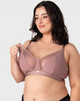One-handed nursing clips on Hotmilk Flawless Rose Dust breastfeeding bra with side-sling for easy feeding access