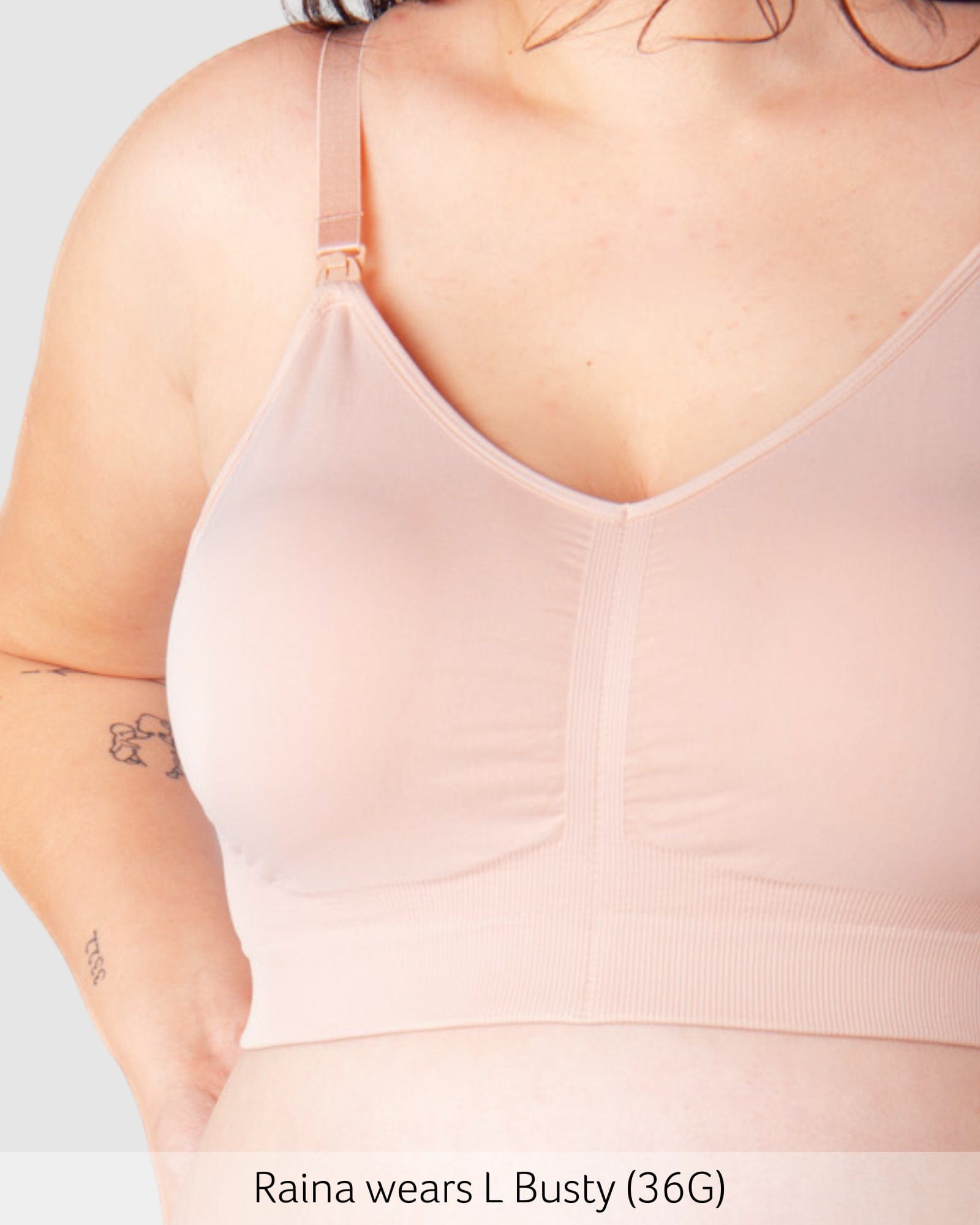 Model wearing Hotmilk My Necessity bra in Ballet Pink, showing front view with close up on fabric