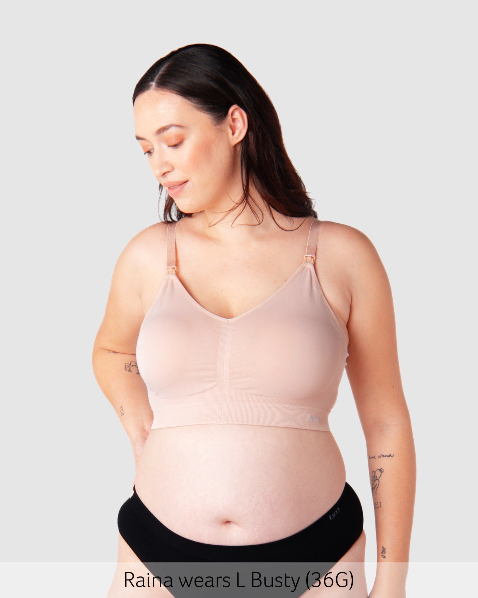 Model wearing Hotmilk My Necessity Bra in Ballet Pink showing front view with full cup support.