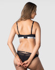 Revolutionize your nursing and breastfeeding journey with the Freedom Pumping and Nursing Bra from Hotmilk. Wear it your way, whether opting for traditional back straps as demonstrated by Ariel, a mother of 3, or enjoying the flexibility of 6 rows of hook and eye closures to adapt seamlessly to your changing body. Elevate your comfort and style with this innovative bra, designed to empower you on your motherhood journey