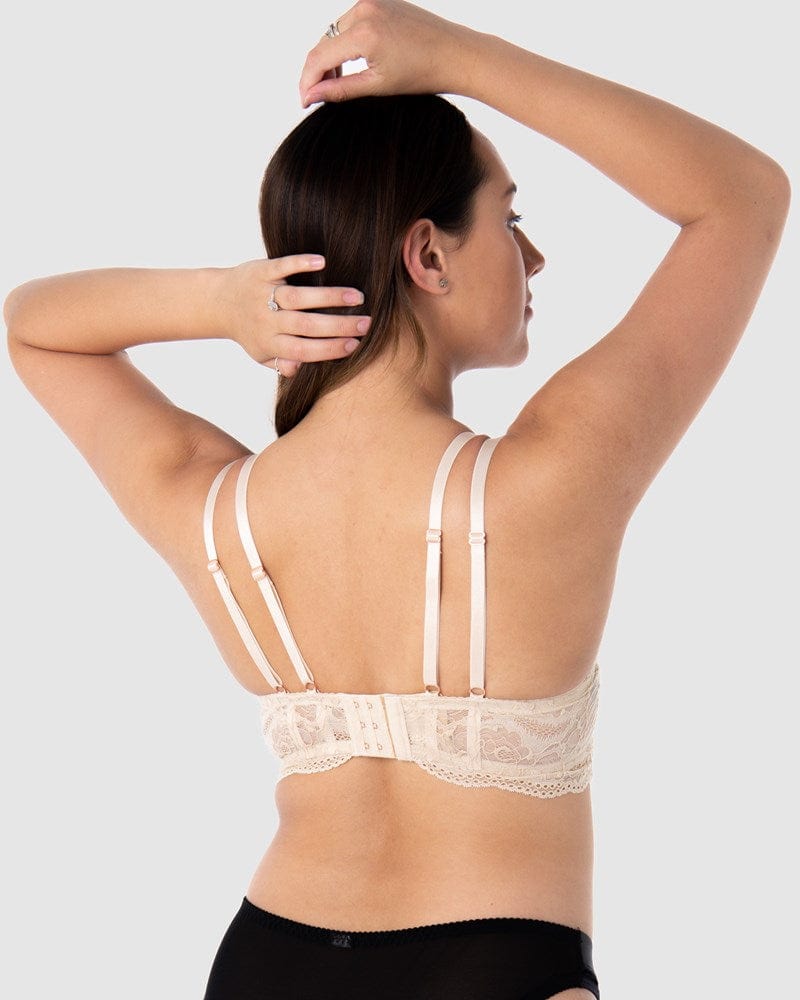The exquisite back view of the Heroine Plunge maternity and nursing bra reveals its fine twin straps that provide both style and enhanced support. This bra showcases feminine lace with a sheer mesh lining. With 6 rows of hook and eye closures, it offers flexibility during pregnancy and postpartum stages