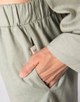 Get up close and personal with Hotmilk US Sage Lounge Pant.' Immerse yourself in the serenity of Sage, a color that embodies relaxation. Crafted from a sumptuous linen blend, these pants deliver the perfect blend of style and comfort. The soft, stretchy waistband ensures ultimate comfort during your downtime. Discover the epitome of loungewear luxury with Hotmilk's Sage Lounge Pant perfect for maternity, pregnancy, breastfeeding and beyond