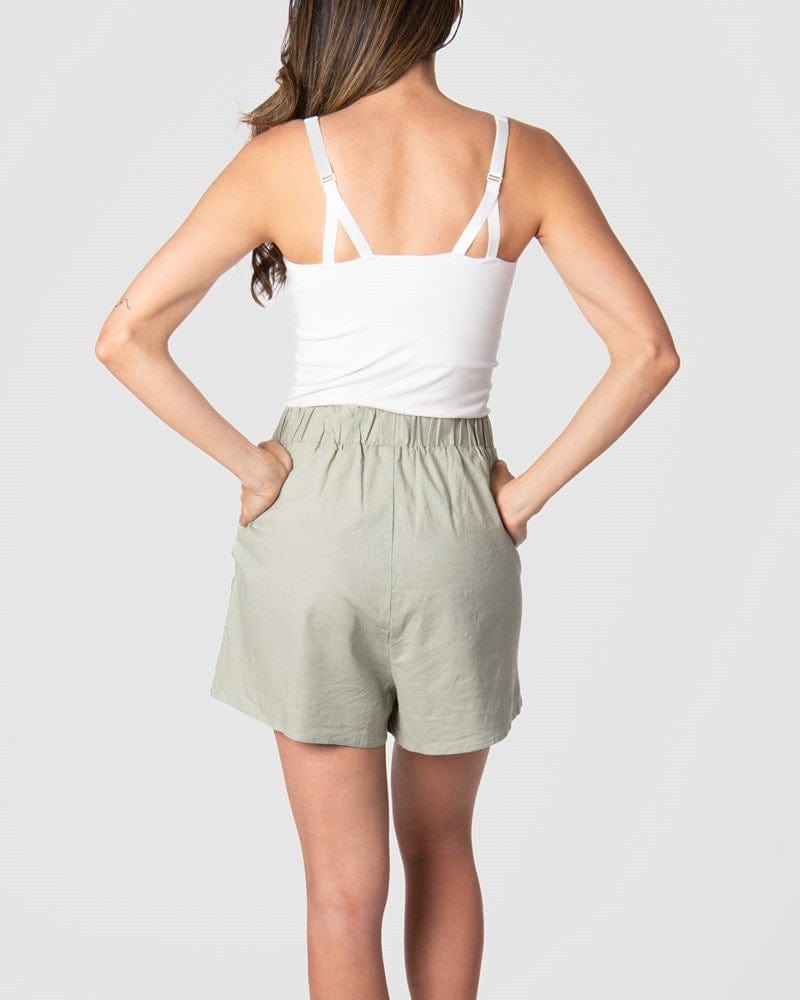 Experience the allure of the Hotmilk 'Sage Lounge Short,' especially when paired with the Hotmilk My Necessity nursing cami to create the ultimate postpartum lounge set. These shorts embody sumptuous comfort, boasting a soft waistband and a flattering above-knee length that seamlessly combines style and relaxation. If you're in pursuit of the perfect loungewear for pregnancy and postpartum comfort, your search ends with Hotmilk US Sage Lounge Short